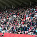 Sunderland fans in action during the game against Blackburn Rovers at the Stadium of Light. Photo courtesy of Chris Fryatt.