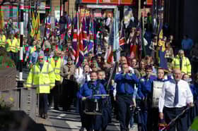 Look at the turnout for the annual parade by Scouts in April 2004. Tell us if it brings back memories for you.