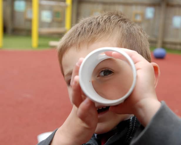 This young pupil had his eyes firmly fixed on the camera in a playground scene from 16 years ago.