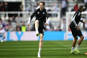 Newcastle United's English midfielder #10 Anthony Gordon (L) warms up with teammates ahead of the English Premier League football match between Newcastle United and Ipswich Town at St James' Park in Newcastle-upon-Tyne, north east England on April 26, 2025. (Photo by Paul ELLIS / AFP)    