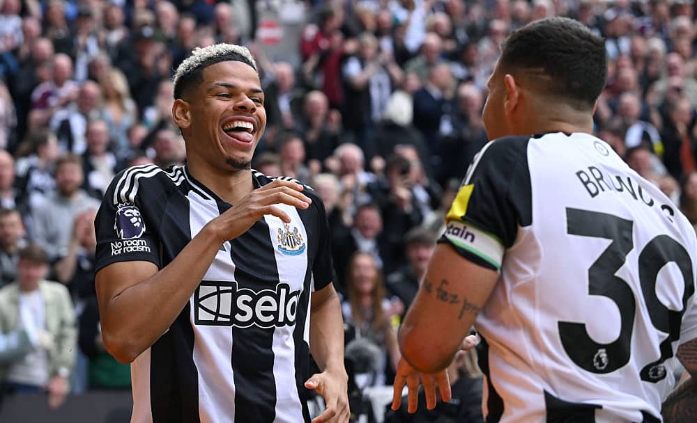 Newcastle United player Will Osula celebrates with Bruno Guimaraes after scoring the third Newcastle goal during the Premier League match between Newcastle United FC and Ipswich Town FC at St James' Park on April 26, 2025 in Newcastle upon Tyne, England. (Photo by Stu Forster/Getty Images)