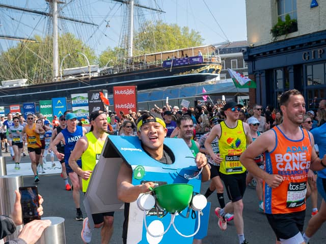 Man runs marathon dressed in Domino's Pizza box