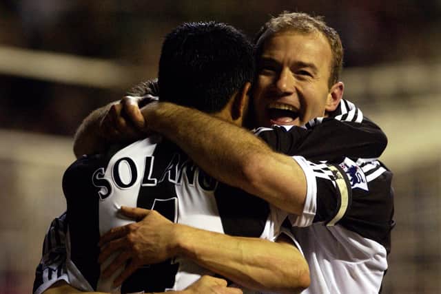 Alan Shearer (right) and Nobby Solano embrace during their Newcastle United days