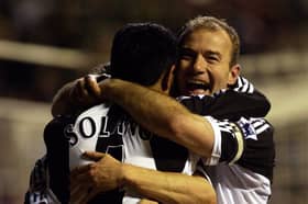 Alan Shearer (right) and Nobby Solano embrace during their Newcastle United days