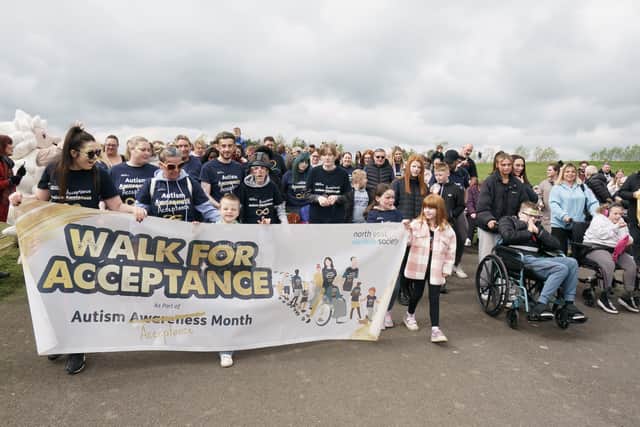 Families at the start of the Walk of Acceptance