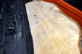 Jurors have been shown a photo of which the prosecution say is a 'trophy' wedge from the Sycamore Gap tree.