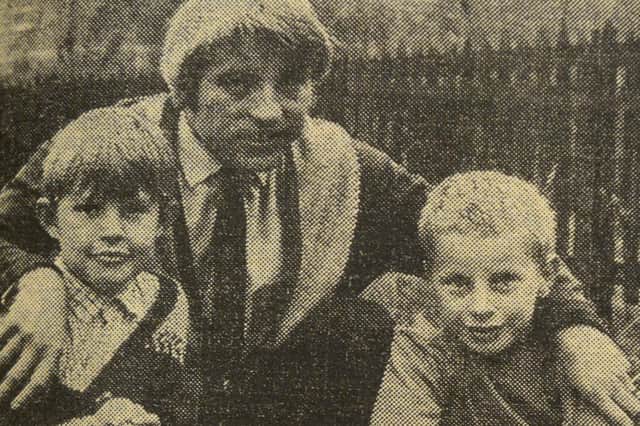 John Brownless with the two boys who found the grenade, his
son Ian, left, and the lad’s pal Paul Vacher.