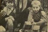The boys with the bricked up area where the grenade was taken until the bomb disposal experts were called.