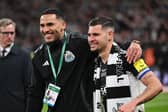 Jamaal Lascelles and Bruno Guimaraes of Newcastle United pose for a photo after the Carabao Cup Final between Liverpool and Newcastle United at Wembley Stadium on March 16, 2025 in London, England. (Photo by Stu Forster/Getty Images)