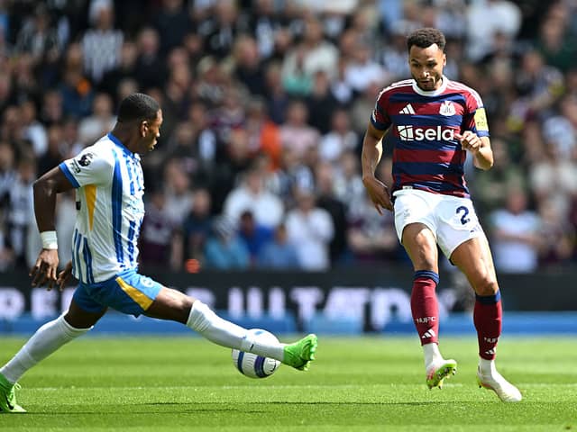 Pervis Estupinan of Brighton & Hove Albion blocks a cross from Jacob Murphy of Newcastle United during the Premier League match between Brighton & Hove Albion FC and Newcastle United FC at Amex Stadium on May 04, 2025 in Brighton, England. (Photo by Mike Hewitt/Getty Images)