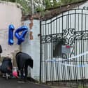 Well wishers leave floral tributes outside Fairfield Industrial Park in the Bill Quay area of Gateshead.