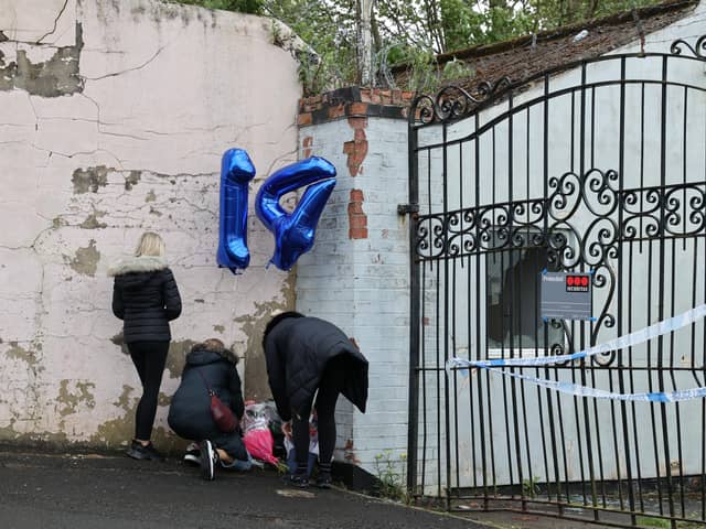 Well wishers leave floral tributes outside Fairfield Industrial Park in the Bill Quay area of Gateshead.