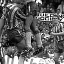 Sunderland against Newcastle at Roker Park in the first leg of their play-off semi-final in 1990. Despite the grainy photo, perhaps you can spot a face in the crowd.