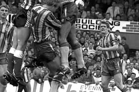 Sunderland against Newcastle at Roker Park in the first leg of their play-off semi-final in 1990. Despite the grainy photo, perhaps you can spot a face in the crowd.
