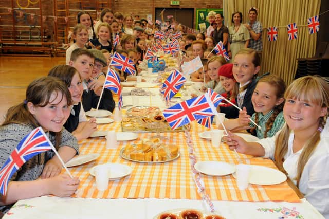 Mortimer Primary School pupils celebrating VE Day in 2011.