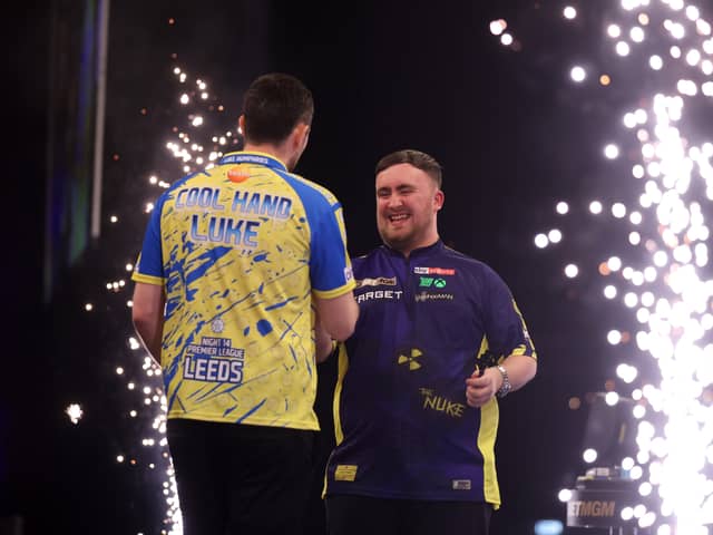Luke Humphries (L) and Luke Littler (R) after a Premier League Darts match