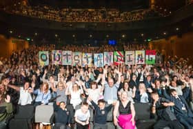 Staff and care leavers celebrating their outstanding Ofsted rating.