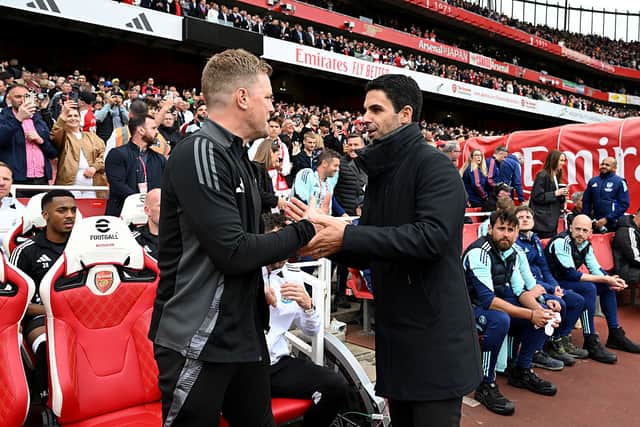 Eddie Howe, Manager of Newcastle United, shakes hands with Mikel Arteta, Manager of Arsenal, prior to the Premier League match between Arsenal FC and Newcastle United FC at Emirates Stadium on May 18, 2025 in London, England. (Photo by David Price/Arsenal FC via Getty Images)