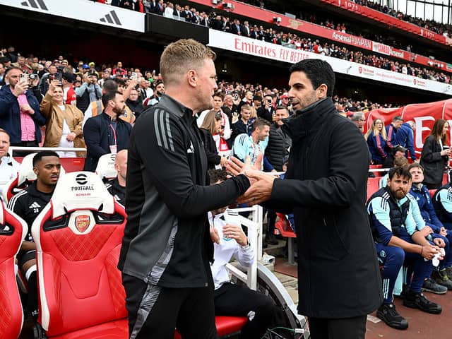 Eddie Howe, Manager of Newcastle United, shakes hands with Mikel Arteta, Manager of Arsenal, prior to the Premier League match between Arsenal FC and Newcastle United FC at Emirates Stadium on May 18, 2025 in London, England. (Photo by David Price/Arsenal FC via Getty Images)