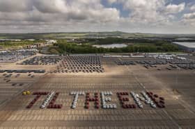 92 red and white Nissan Qashqai cars spell out 'Til the End' - SAFC's motto throughout the playoff campaign.