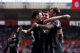 Kieran Tierney celebrates his goal with his Arsenal teammates.