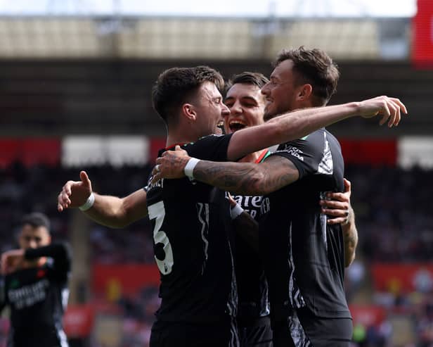 Kieran Tierney celebrates his goal with his Arsenal teammates.