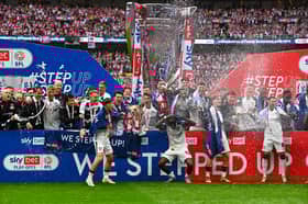 Sunderland players celebrate their promotion.