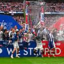 Sunderland players celebrate their promotion.