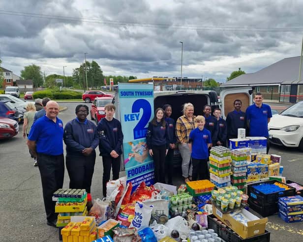  Representatives of the The 10th Boys' Brigade and Girls Association in South Tyneside with the fundraised food parcels