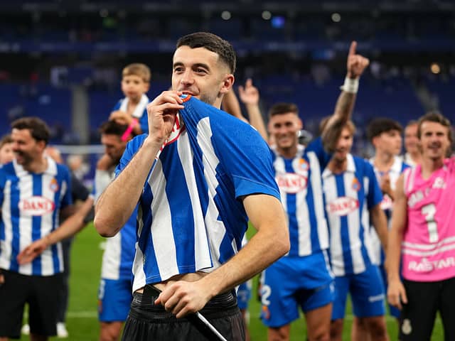 Joan Garcia of RCD Espanyol kisses his badge following the LaLiga match between RCD Espanyol de Barcelona and UD Las Palmas at RCDE Stadium on May 24, 2025 in Barcelona, Spain. (Photo by Alex Caparros/Getty Images)