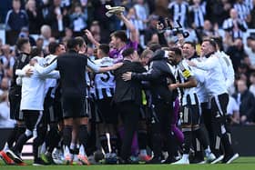 The Newcastle players in a huddle celebrate UEFA Champions League qualification after the Premier League match between Newcastle United FC and Everton FC at St James' Park on May 25, 2025 in Newcastle upon Tyne, England. (Photo by Stu Forster/Getty Images)