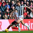 Dan Burn in action against Sunderland. 