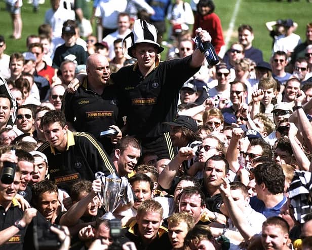 Paul Van-Zandvliet and Doddie Weir of Newcastle Falcons are carried on the shoulders of their supporters after an Allied Dunbar Premiership One match against Harlequins at The Stoop in London. Newcastle Falcons won the match 44-20, gaining them the League trophy. Credit: Jamie  McDonald/Allsport