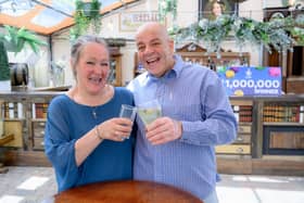 Terry and Caroline Gillings celebrate winning £1m on the National Lottery.