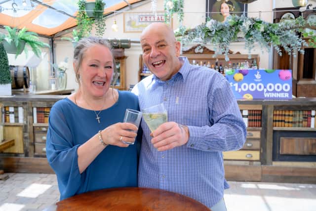 Terry and Caroline Gillings celebrate winning £1m on the National Lottery.