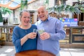 Terry and Caroline Gillings celebrate winning £1m on the National Lottery.