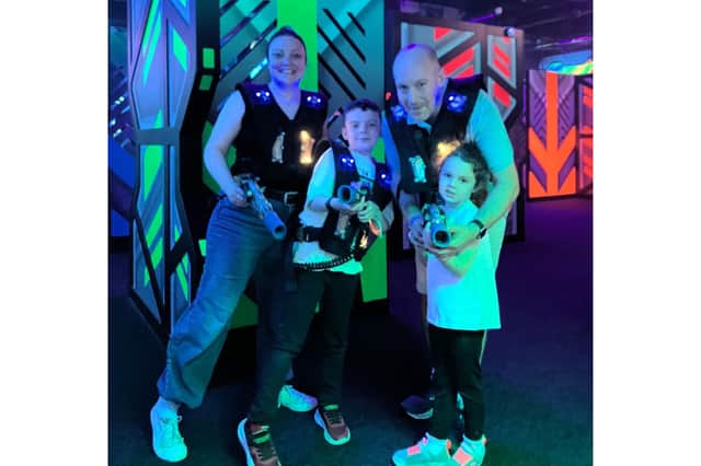 Tom Morton and his family in the Laser Tag arena at Butlin's Bognor Regis's PlayXperience centre