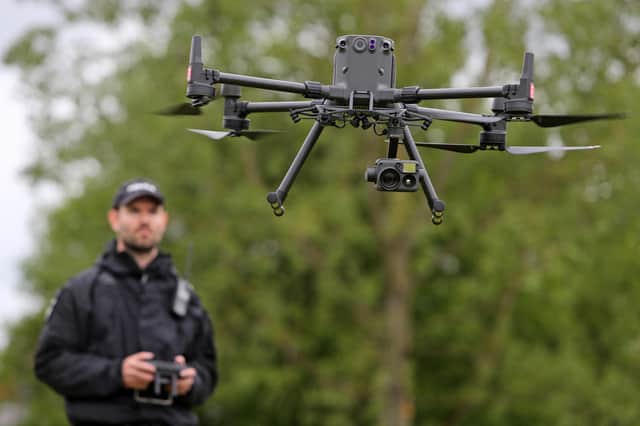 A Sunderland woman was caught in a field by a heat-seeking police drone after she fled from a stolen car.