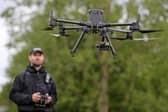 A Sunderland woman was caught in a field by a heat-seeking police drone after she fled from a stolen car.