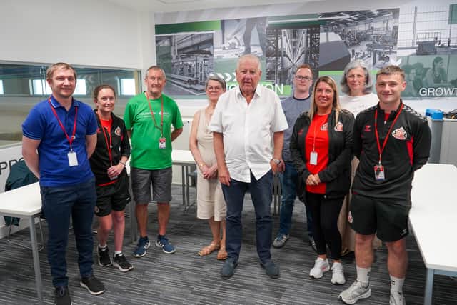Sir Bob Murray with some of the volunteers at the Foundation of Light.