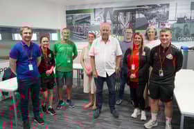 Sir Bob Murray with some of the volunteers at the Foundation of Light.