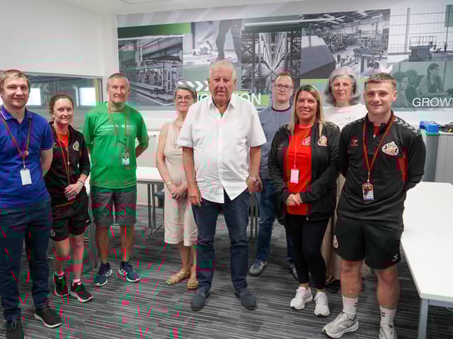 Sir Bob Murray with some of the volunteers at the Foundation of Light.