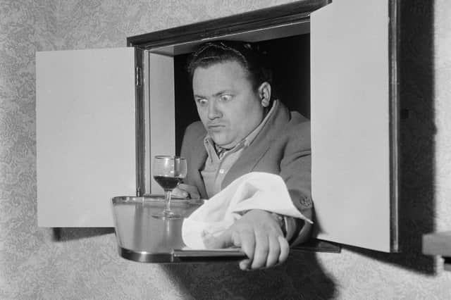 Many homes used to have a serving hatch between the kitchen and dining room