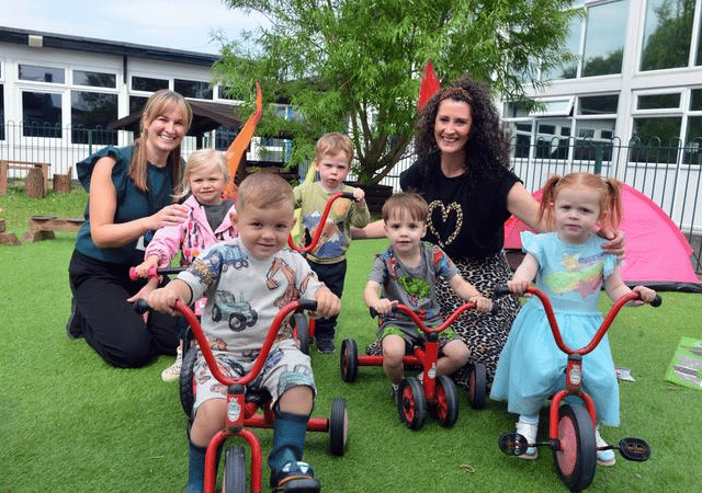 Nursery assistant Hayley Malpass and manager Emma Hartley celebrate Stanley's nursery at Whitburn and Marsden family hub Ofsted report with some of the youngsters.