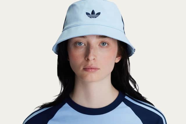 A festival-ready favourite, the Tour Bucket Hat blends classic Adidas flair with unmistakable Oasis attitude.