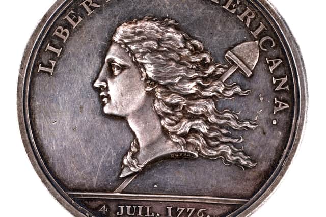 One side of the Libertas medal which is going up for auction.