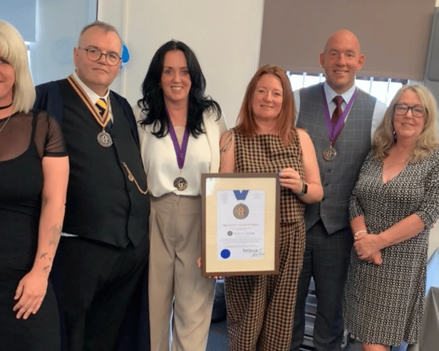 The Billy's Lifeline team with the President’s Award of Merit from the Society of Bereavement Practitioners.