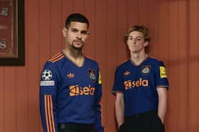 Bruno Guimaraes (left) and Anthony Gordon wearing the Newcastle United third strip.