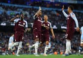  Marcus Rashford of Aston Villa celebrates scoring his team's first goal with Youri Tielemans, Jacob Ramsey and Amadou Onana during the Premier League match between Manchester City FC and Aston Villa FC at Etihad Stadium on April 22, 2025 in Manchester, England. 