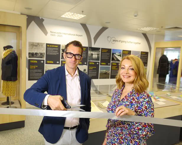 Keith Merrin, Director of North East Museums, and Alice Andreasen, Chief Corporate Affairs Officer at Newcastle Airport, officially open the unveil the new exhibition.